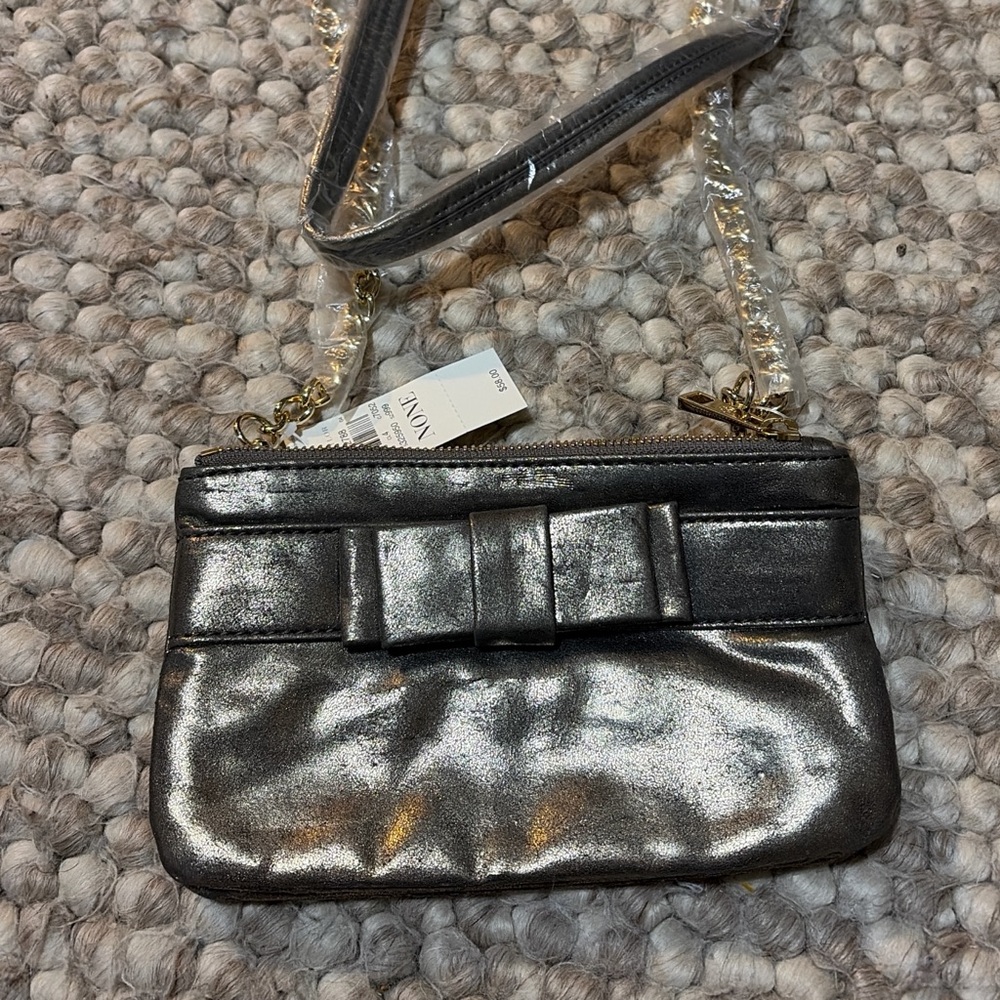 Ann Taylor  Metallic Silver Clutch with Bow
